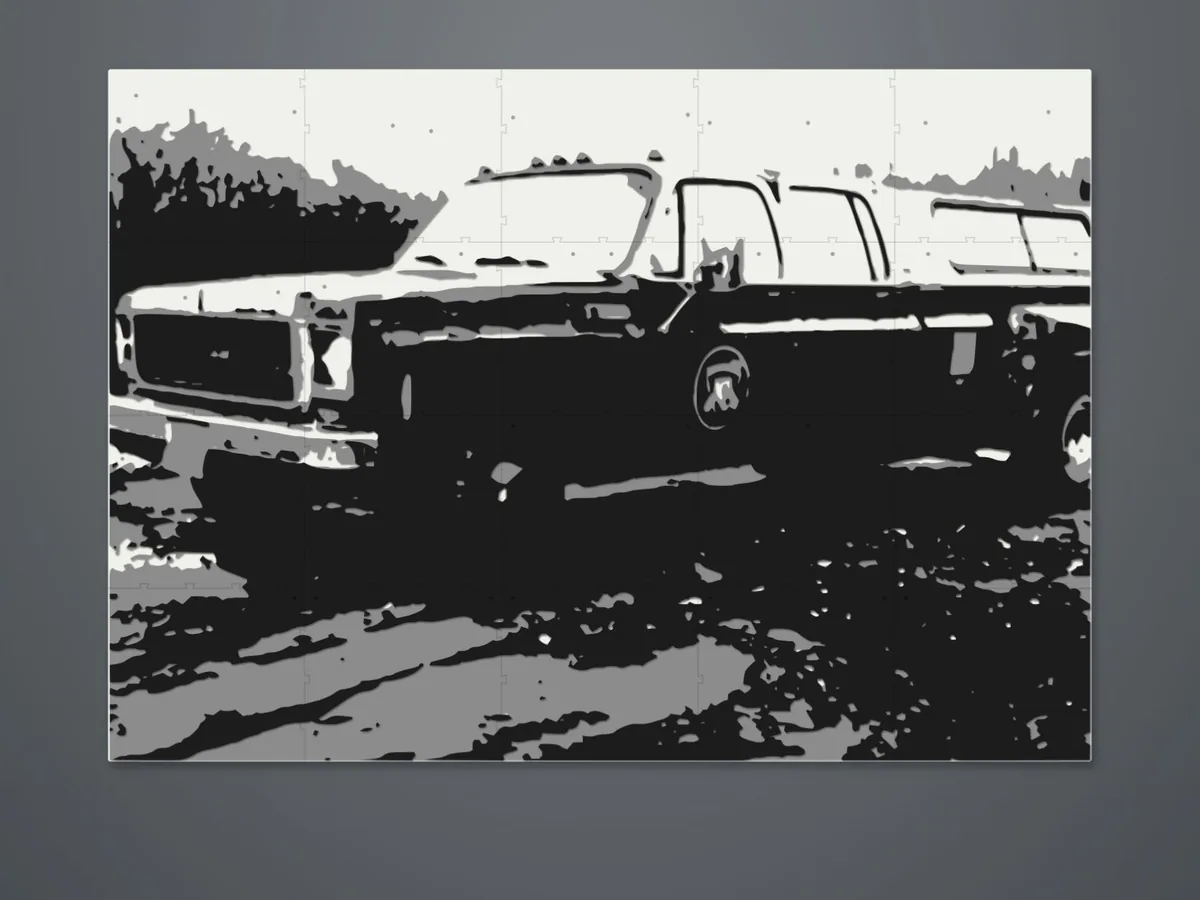 Wanddecoratie van een oude pick-up in zwart, grijs en wit